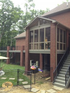 Orion Twp MI Porch Builder Trex  Transcends custom brick work and glass windows